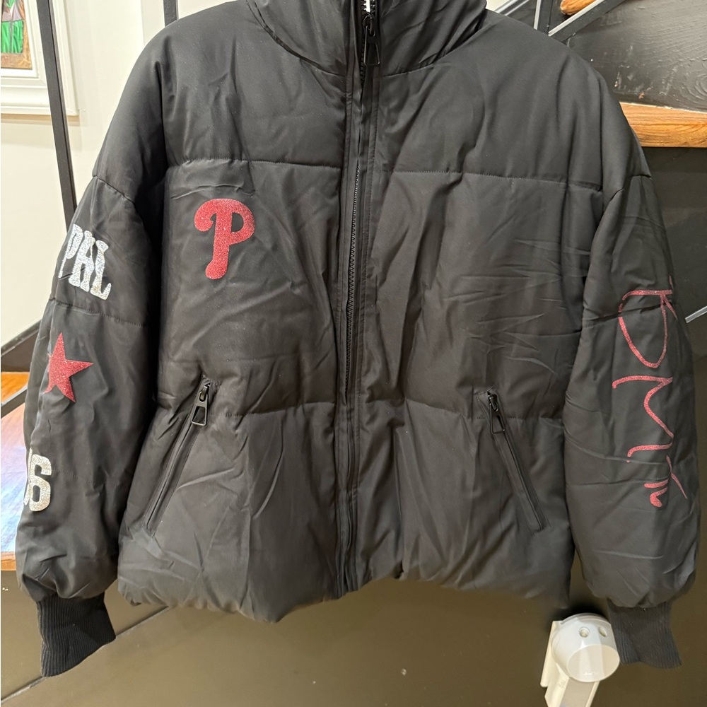Black Puffer Jacket with Red Accents